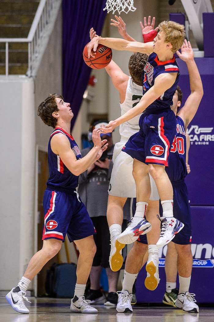 Trent Nelson  |  The Salt Lake TribuneSpringville's Joshua Elison (3) blocks a shot by Olympus's Harrison Creer (23) as Springville faces Olympus in the 4A state high school basketball championship game, Saturday March 4, 2017.