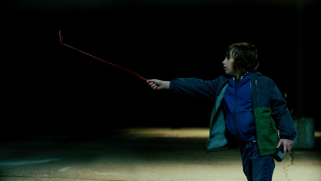 (Jasper Savage  |  Amblin Partners / Focus Features) Azhy Robertson plays Oliver, a boy who connects with an evil presence, in the horror-thriller "Come Play."
