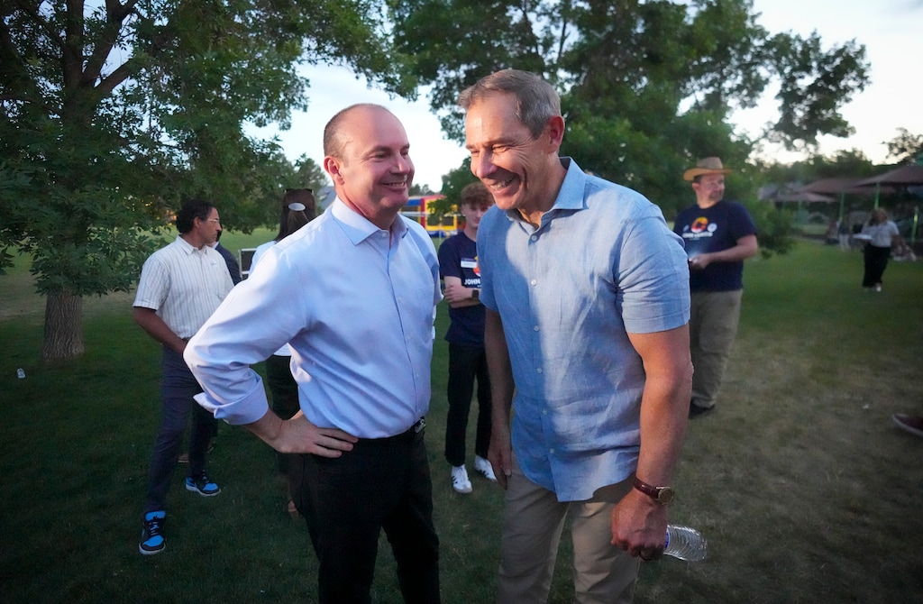 (Bethany Baker | The Salt Lake Tribune) U.S. Sen. Mike Lee, left, meets with U.S. Sen. candidate Rep. John Curtis during a watch party in Provo on Tuesday, June 25, 2024.