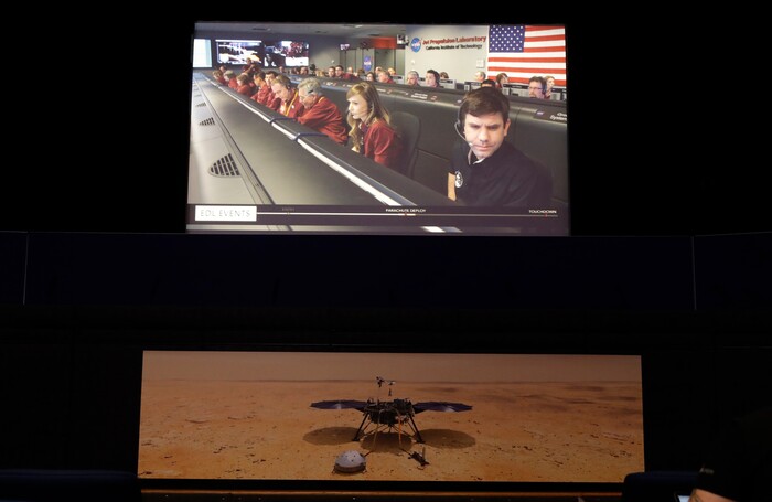 (Marcio Jose Sanchez | The Associated Press) A video feed of the InSight lander mission control room is seen at NASA's Jet Propulsion Laboratory Monday, Nov. 26, 2018, in Pasadena, Calif. The NASA InSight lander arrived successfully on Mars' surface.