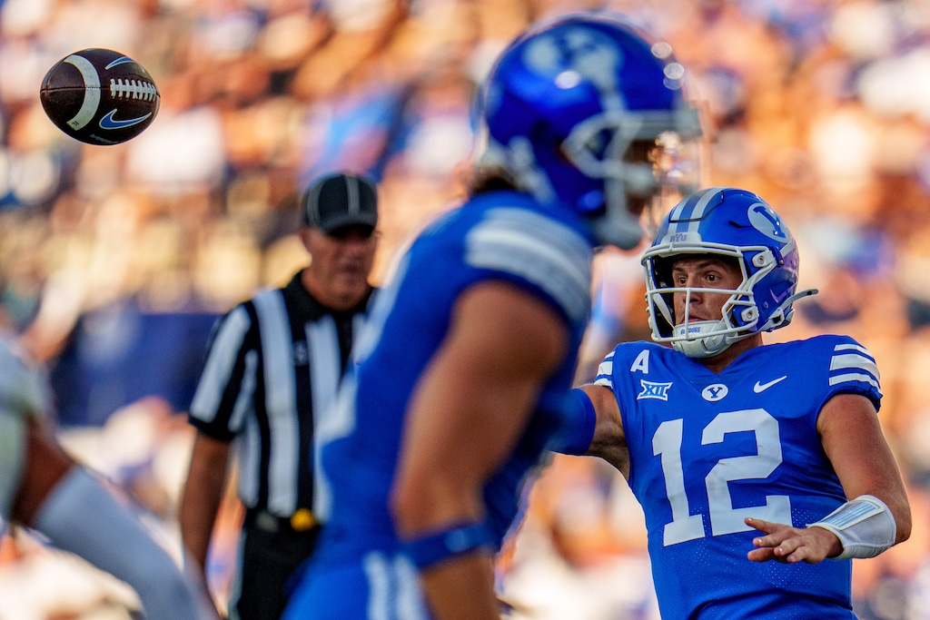 (Trent Nelson  |  The Salt Lake Tribune) Brigham Young Cougars quarterback Jake Retzlaff (12) throws the ball as BYU hosts Southern Illinois, NCAA football in Provo on Saturday, Aug. 31, 2024.