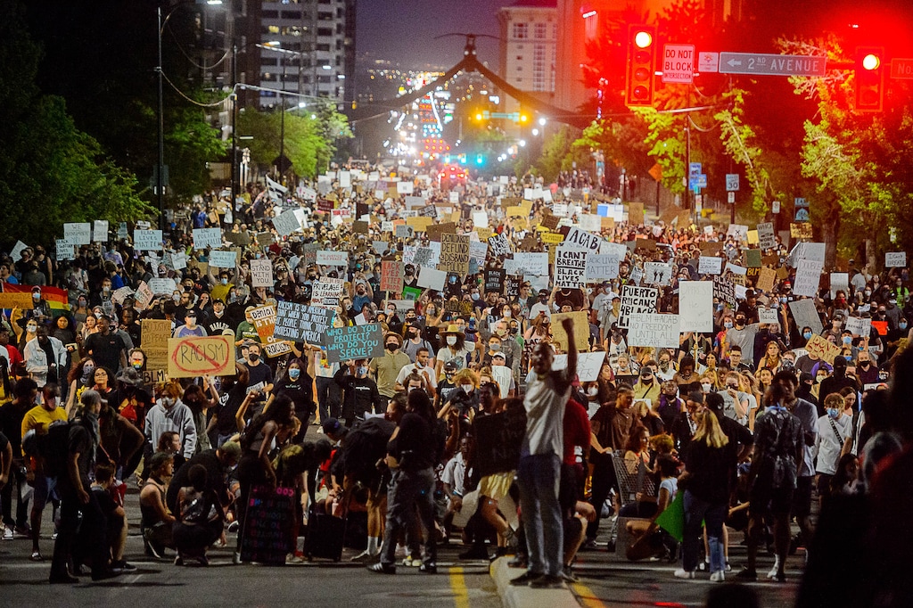 (Trent Nelson | Tribune file photo) Protesters march against police brutality in Salt Lake City on Thursday, June 4, 2020. A Utah state lawmaker may be backing off -- or at least revising -- his proposed bill to create a criminal defense for accidentally running over a protester.