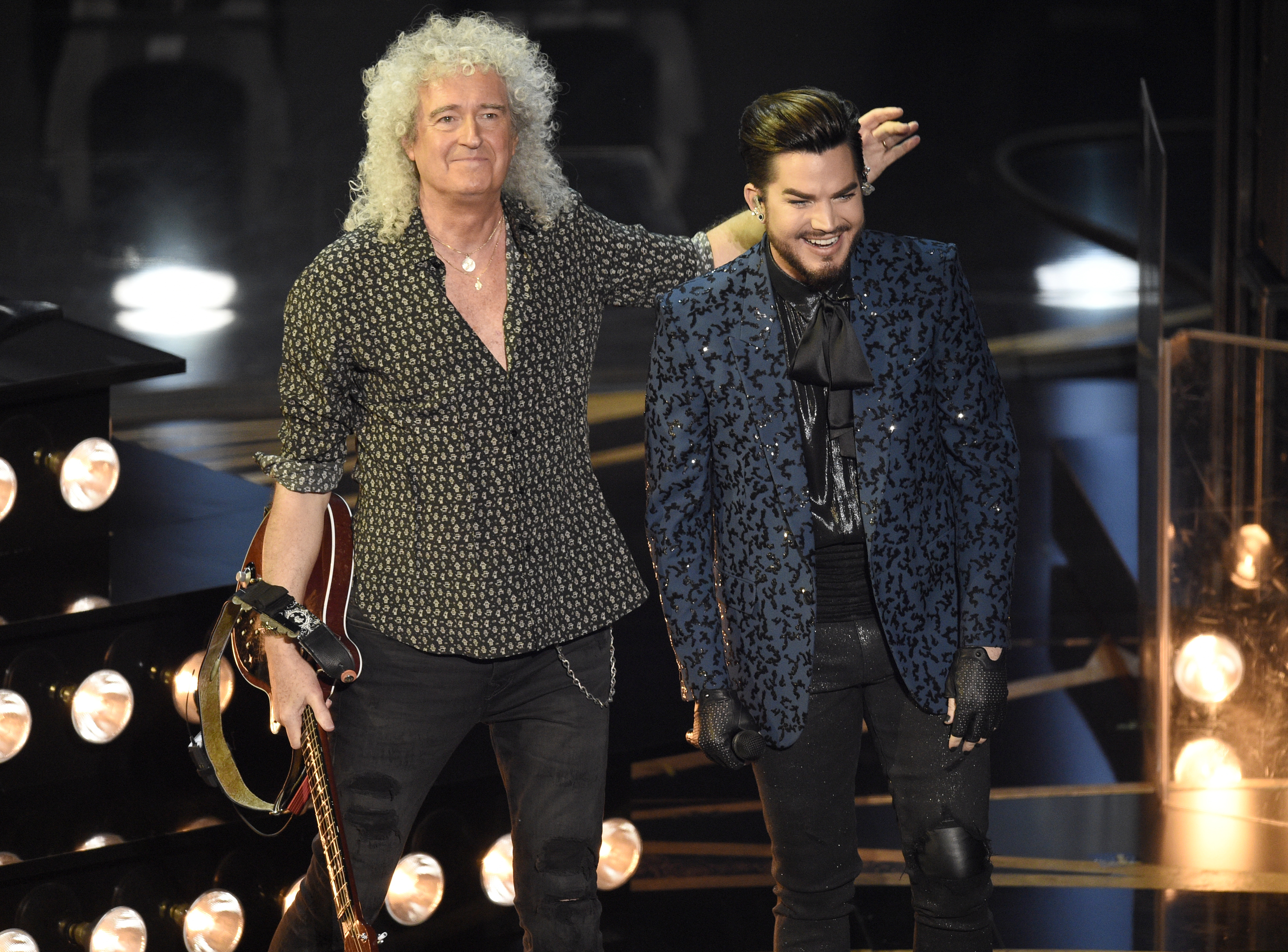 Adam Lambert, right, and Brian May of Queen acknowledge the audience after a performance at the Oscars on Sunday, Feb. 24, 2019, at the Dolby Theatre in Los Angeles. (Photo by Chris Pizzello/Invision/AP)