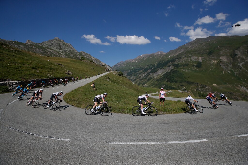 Stage winner Britain's Geraint Thomas, center left, and Britain's Chris Froome, center right, speed down Cormet de Roseland pass during the eleventh stage of the Tour de France cycling race over 108.5 kilometers (67.4 miles) with start in Albertville and finish in La Rosiere Espace San Bernardo, France. (AP Photo/Christophe Ena )