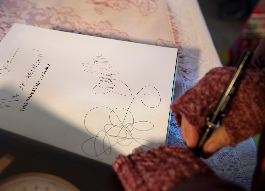 (Scott Sommerdorf   |  The Salt Lake Tribune)   Blake Spalding, co-owner of Hell's Backbone Grill in Boulder, signs a copy of the new cookbook, "This Immeasurable Place: Food and Farming from the Edge of Wilderness," December 9, 2017.  