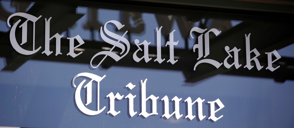 In this April 20, 2016, file photo, shows the Salt Lake Tribune sign in Salt Lake City. The Salt Lake Tribune has announced plans to become a nonprofit as it moves toward a nontraditional model that it hopes will ensure long term stability after years of financial struggles. Salt Lake Tribune editor Jennifer Napier-Pearce said Wednesday, May 8, 2019, the move is aimed at finding a better way to fund the newspaper's operations because declines in advertising and circulation revenues that have plagued the industry seem irreversible. (AP Photo/Rick Bowmer, File)