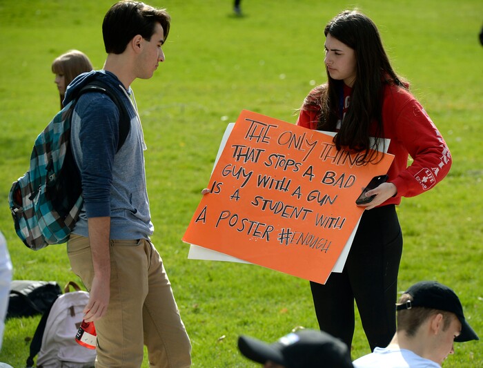 (Al Hartmann  |  The Salt Lake Tribune) 	
Over one hundred students at Highland High School staged a walkout Friday April 20, 2018 in honor of the anniversary of the Columbine High School massacre. Demonstrators walked from the school to Sugar House Park where they made posters, wrote letters to their congressmen and listened to speakers. 