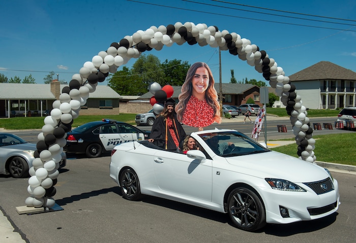 (Rick Egan  |  The Salt Lake Tribune)     Alta High seniors join in the parade of 2020 graduates in a “drive through” graduation ceremony at Alta High, Thursday, May 28, 2020.