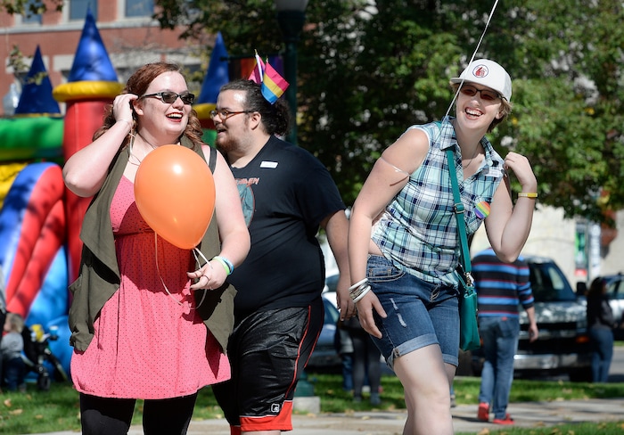 (Scott Sommerdorf   |  The Salt Lake Tribune)   
Amanda Mehner, left, Michael Mehner, and Naomi Tuft, right, dance at the fifth annual Provo Pride Festival, Saturday, September 16, 2017.