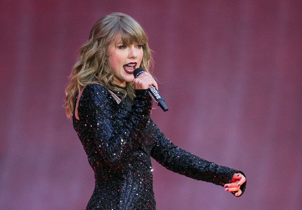 FILE - In this June 22, 2018, file photo, singer Taylor Swift performs on stage in concert at Wembley Stadium in London. ABC will air the one-hour concert special “Taylor Swift City of Lover Concert” at 10 p.m. EDT. It was filmed last September at L’Olympia Theater in Paris.  (Photo by Joel C Ryan/Invision/AP, File)