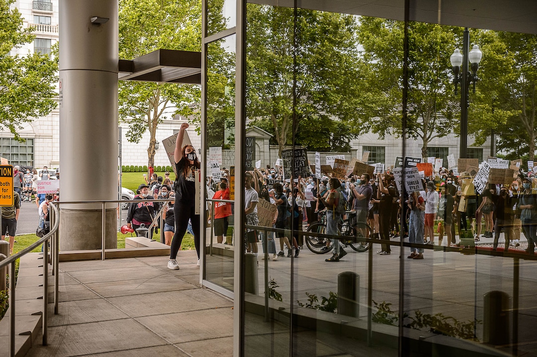 (Trent Nelson  |  The Salt Lake Tribune) People gather at the Salt Lake County District Attorney's office to protest against police brutality in Salt Lake City on Saturday, June 13, 2020.