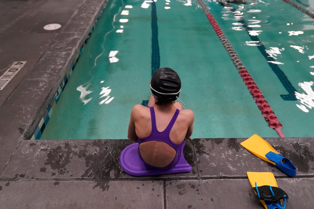 (Rick Bowmer | AP) A ban on transgender athletes playing female school sports in Utah would affect transgender girls like this 12-year-old swimmer seen at a pool in Utah on Monday, Feb. 22, 2021. She and her family spoke with The Associated Press on the condition of anonymity to avoid outing her publicly. She cried when she heard about the proposal that would ban transgender girls from competing on girls’ sports teams in public high schools, which would separate her from her friends. She’s far from the tallest girl on her team, and has worked hard to improve her times but is not a dominant swimmer in her age group, her coach said. “Other than body parts I’ve been a girl my whole life,” she said.