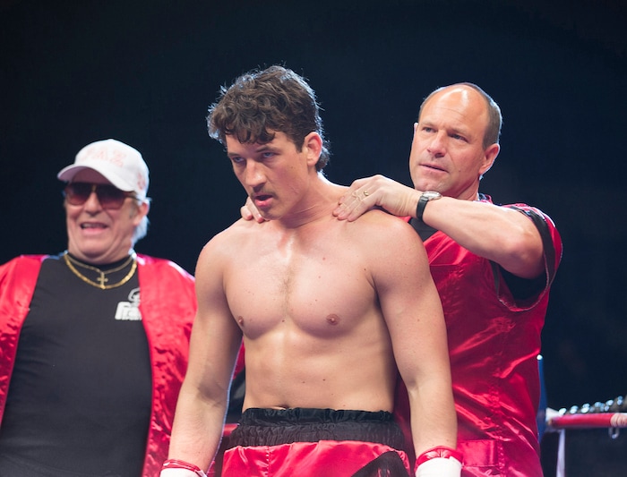 In this image released by Open Road Films, Ciaran Hinds, from left, Miles Teller and Aaron Eckhart appear in a scene from the film, "Bleed For This." (Seacia Pavao/Open Road Films via AP)
