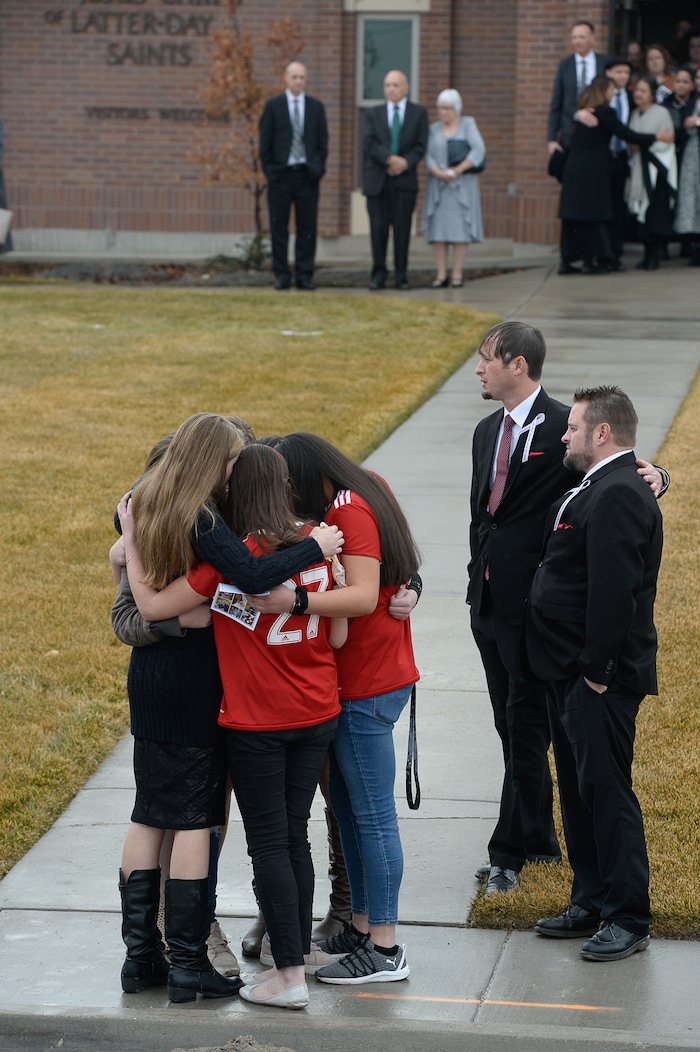(Francisco Kjolseth  |  The Salt Lake Tribune) People embrace at the conclusion of funeral services for Consuelo Alejandra Haynie and her children Milan, 12, Alexis, 15 and Matthews, 14, in Grantsville on Friday, Jan. 24, 2020. The killing of the Utah mother and three of her children by a gunman identified by police as her 16-year-old son is "nearly unbearable" for the father who survived, a lawyer said Thursday, Jan. 23, 2020.