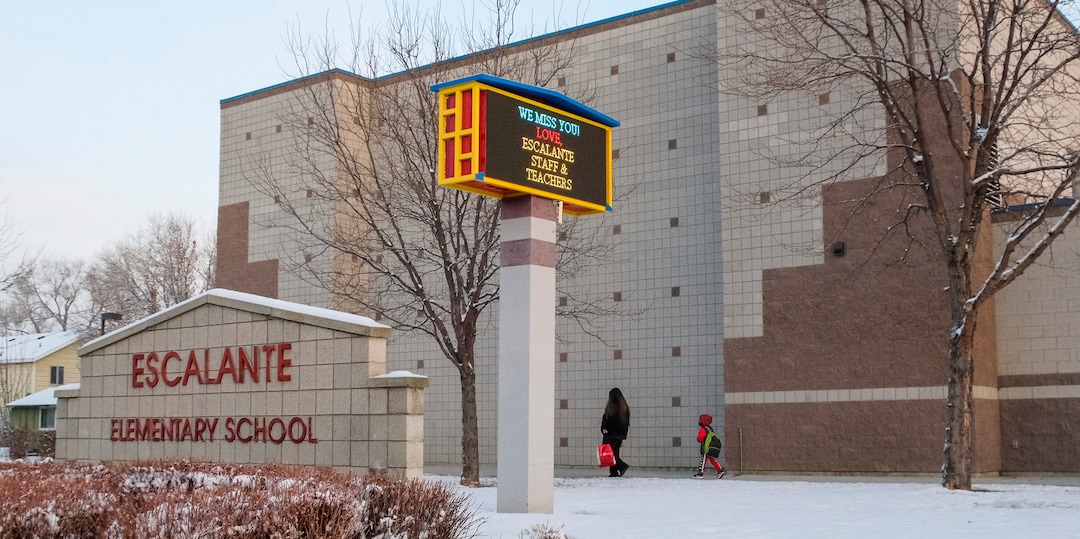 (Leah Hogsten | The Salt Lake Tribune) Students of Escalante Elementary in Salt Lake City head back to class, January, 25, 2021. Salt Lake City School District reopened all of the district's elementary schools to in-person learning on Monday. It is the first time students in kindergarten through sixth grade are back in the classroom for a full day of school since they first closed for the pandemic in March 2020.