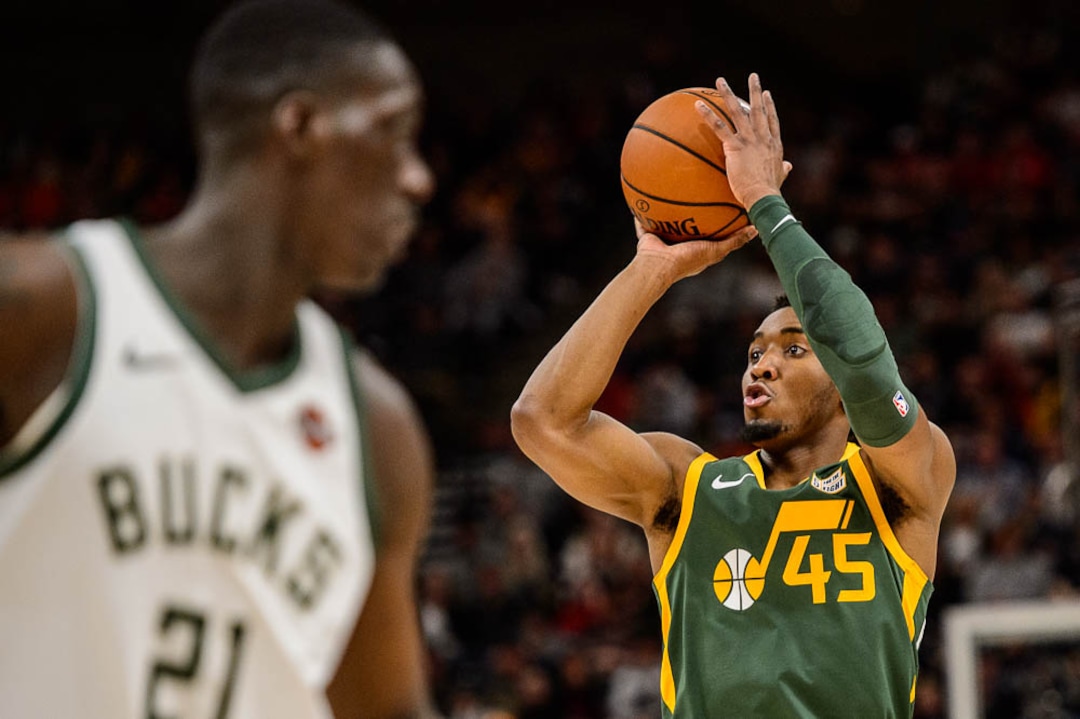 (Trent Nelson | The Salt Lake Tribune)  Utah Jazz guard Donovan Mitchell (45) shoots as the Utah Jazz host the Milwaukee Bucks, NBA basketball in Salt Lake City on Saturday March 2, 2019.