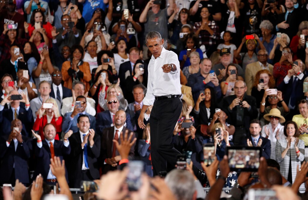 Former President Barack Obama reacts as he walks onstage at a rally in support of Senate candidate Jacky Rosen and other Nevada Democrats, Monday, Oct. 22, 2018, in Las Vegas. (AP Photo/John Locher)