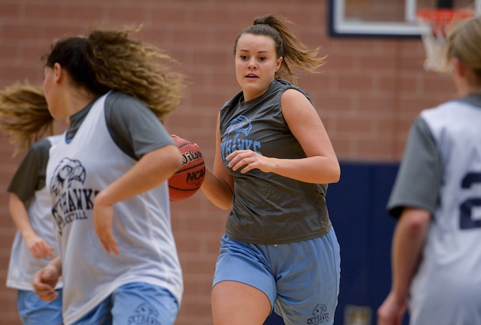 (Leah Hogsten  |  The Salt Lake Tribune)  Basketball player Lauren Gustin is averaging  double points and double rebounds during games at center for the Salem Hills girls' basketball team. Gustin has committed to play for University of Idaho next fall. 