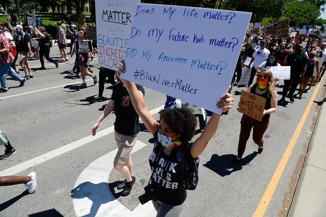 (Francisco Kjolseth  |  The Salt Lake Tribune) Demonstrators march the streets of downtown Salt Lake City for a protest as part of a series of Juneteenth celebrations on Friday, June 19, 2020.