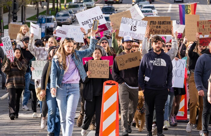 (Rick Egan | The Salt Lake Tribune) Hundreds of protesters march down State Street after a bans off our bodies protest hosted by Planned Parenthood, on Tuesday, May 3, 2022.
