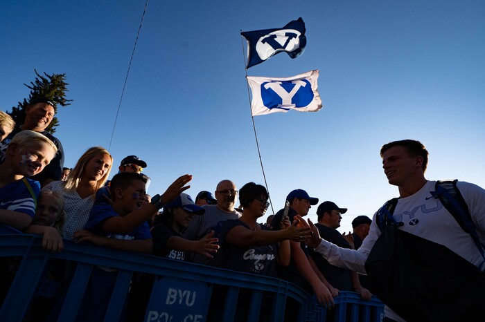 (Francisco Kjolseth | The Salt Lake Tribune) Cougar fans cheer on their team as they arrive at LaVell Edwards Stadium in Provo, Saturday, Sept. 25, 2021, for their game against South Florida.