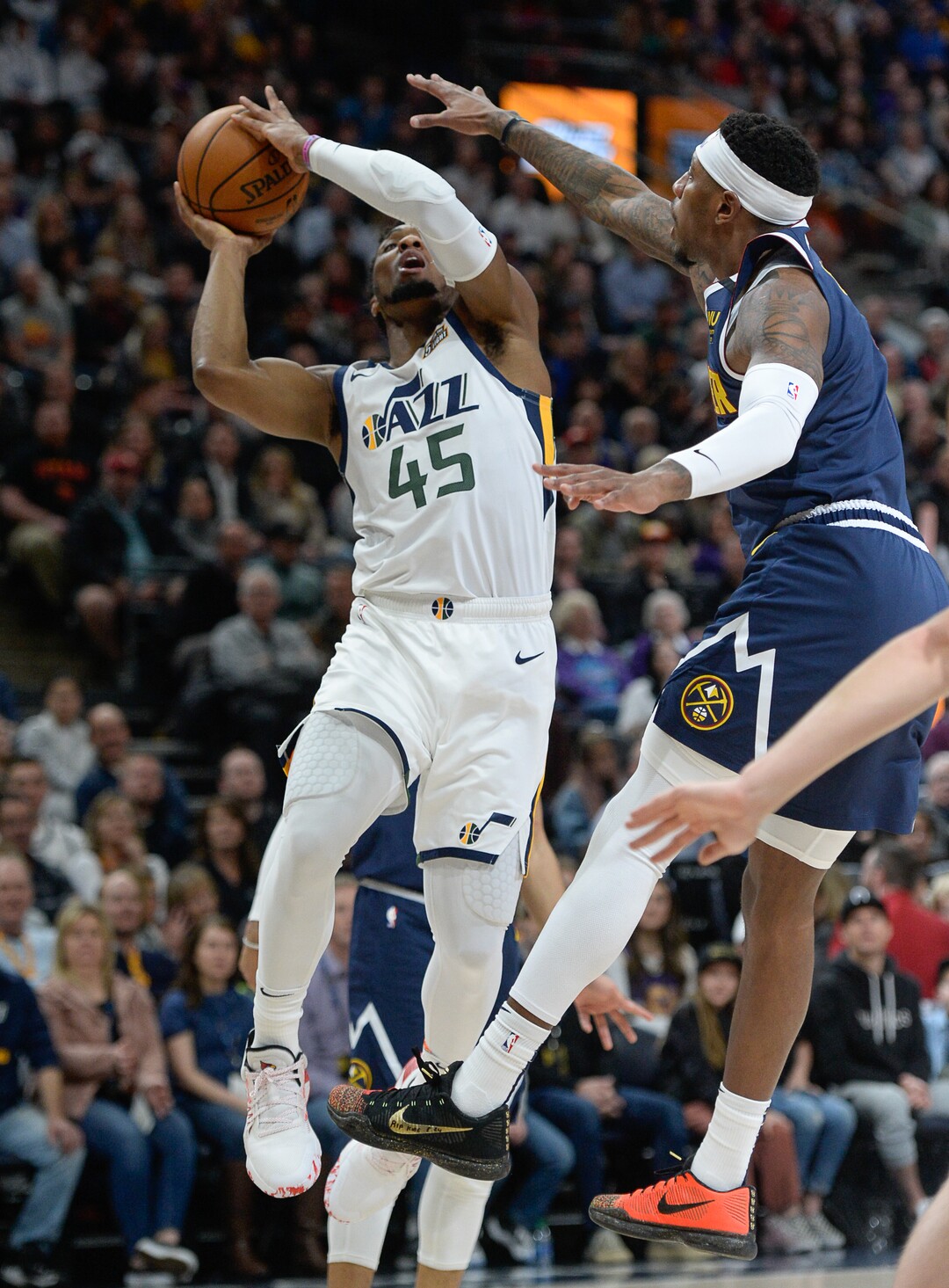 (Francisco Kjolseth  |  The Salt Lake Tribune) Utah Jazz guard Donovan Mitchell (45) pushes past the defense as the Utah Jazz host the Denver Nuggets in their NBA basketball game at Vivint Smart Home Arena in Salt Lake City on Wednesday, Feb. 5, 2020.
