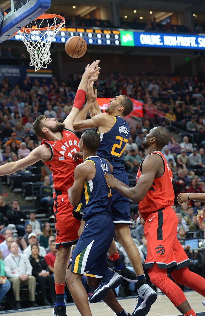 (Leah Hogsten  |  The Salt Lake Tribune) Utah Jazz center Rudy Gobert (27)battles Toronto Raptors center Jonas Valanciunas (17). The Utah Jazz lead the Toronto Raptors 54-53 at Vivint Smart Home Arena, Friday, November 3, 2017
