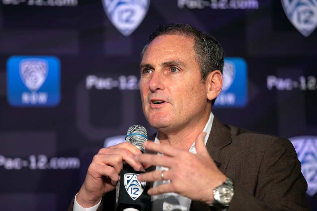 FILE - In this Oct. 7, 2019, file photo, Pac-12 Commissioner Larry Scott speaks to reporters during the Pac-12 Conference women's NCAA college basketball media day in San Francisco. The conference announced on Wednesday evening that Larry Scott will step down from his position on June 30. (AP Photo/D. Ross Cameron, File)