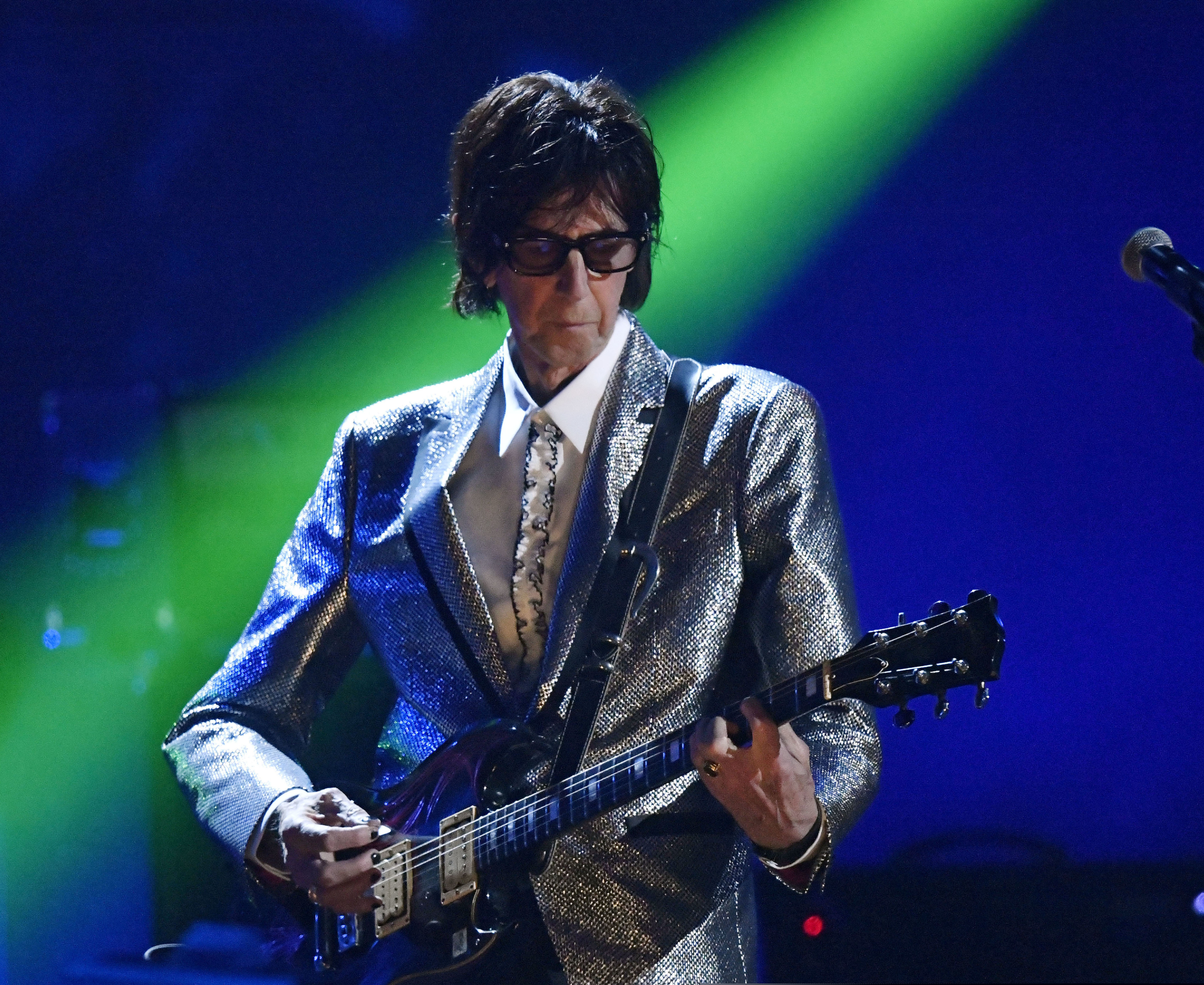 (David Richard | AP file photo) FILE - In this April 14, 2018, file photo, Ric Ocasek, from the Cars, performs during the Rock and Roll Hall of Fame Induction ceremony in Cleveland. Ocasek, famed frontman for The Cars rock band, has been found dead in a New York City apartment. The New York City police department said officers responding to a 911 call found the 75-year-old Ocasek on Sunday, Sept. 15, 2019.