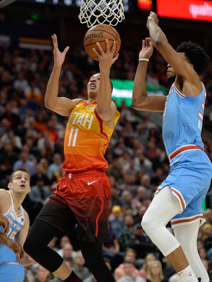 (Francisco Kjolseth  |  The Salt Lake Tribune)  Utah Jazz guard Dante Exum (11) battles the Sacramento Kings in the NBA game at Vivint Smart Home Arena Wed., Nov. 21, 2018, in Salt Lake City.