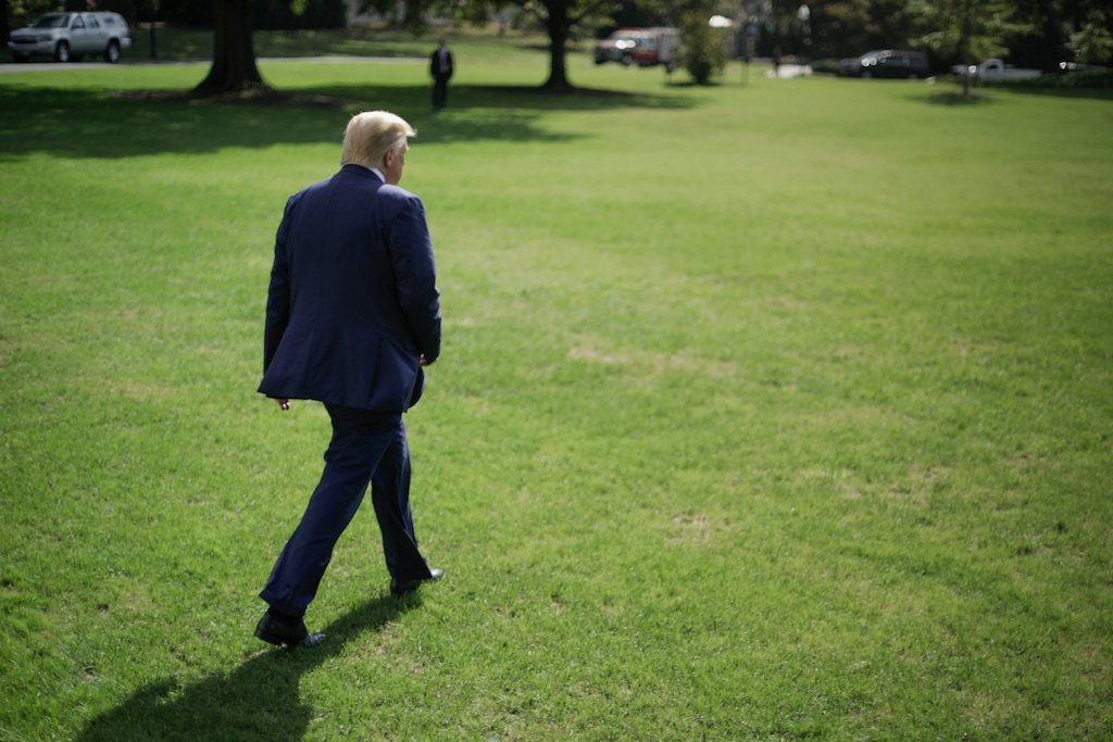 President Donald Trump walks across the South Lawn of the White House in Washington, Friday, Oct. 4, 2019, before boarding Marine One helicopter for the short trip to nearby Walter Reed National Military Medical Center in Bethesda, Md. (AP Photo/Pablo Martinez Monsivais)