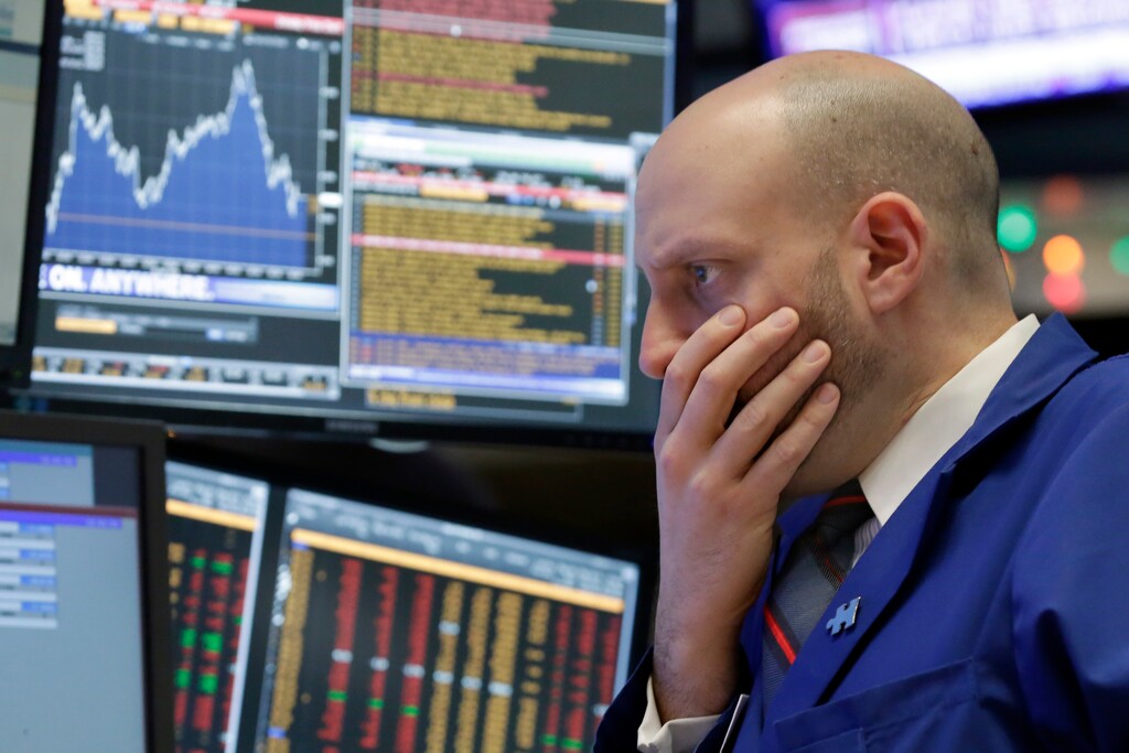 Specialist Meric Greenbaum works at his post on the floor of the New York Stock Exchange, Friday, Dec. 11, 2015. Stocks are sharply lower in midday trading, led by more declines in energy and materials stocks as prices for oil and other commodities slide. (AP Photo/Richard Drew))