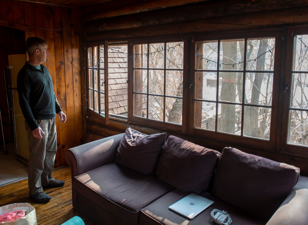 (Rick Egan  |  The Salt Lake Tribune)      David Hampshire checks the view from his home in Allen Park, which is closing. He has to be out of the house by the end of the day the day Monday, Jan. 14, 2019.