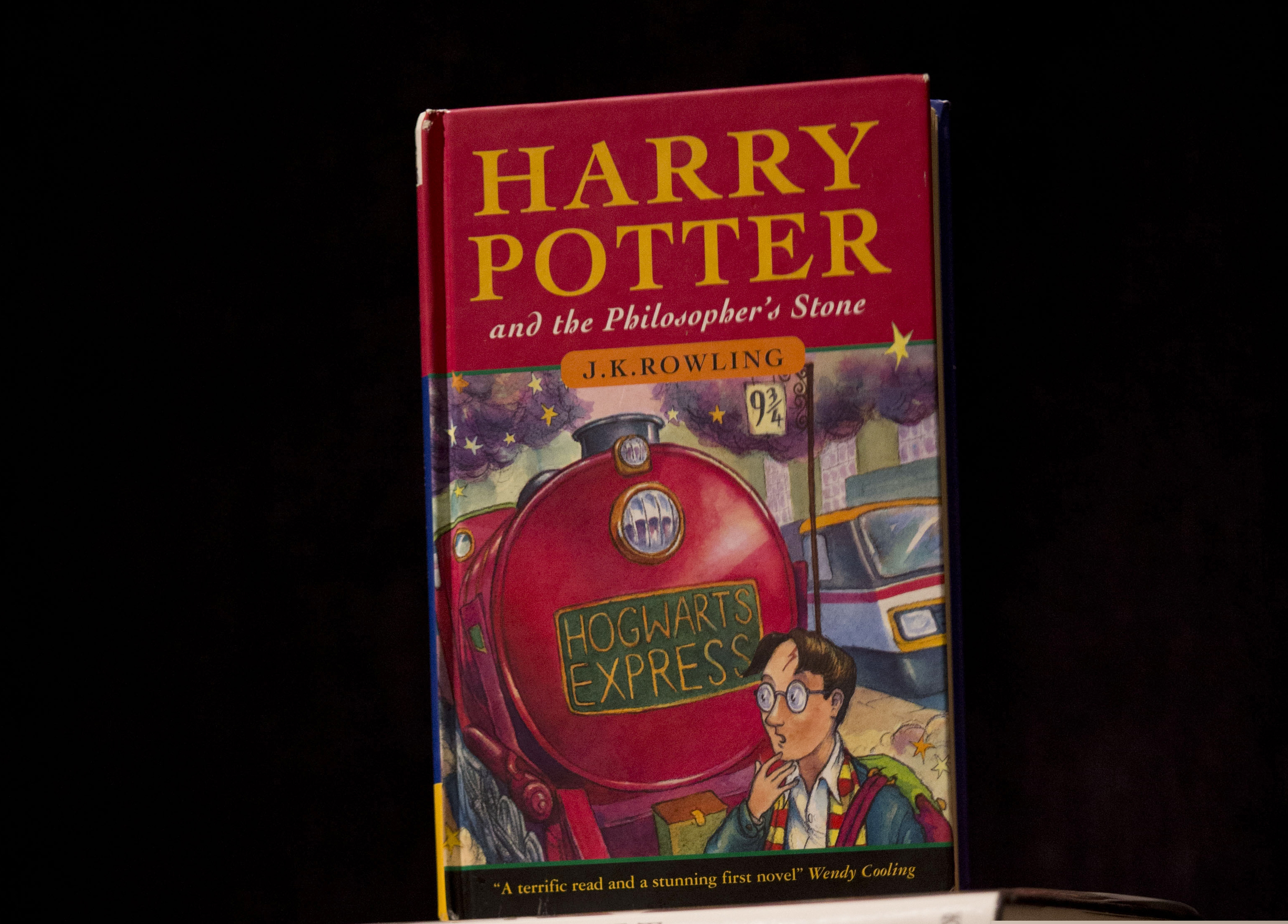 (Matt Dunham | AP file photo) A first edition copy of the first Harry Potter book "Harry Potter and the Philosopher's Stone."