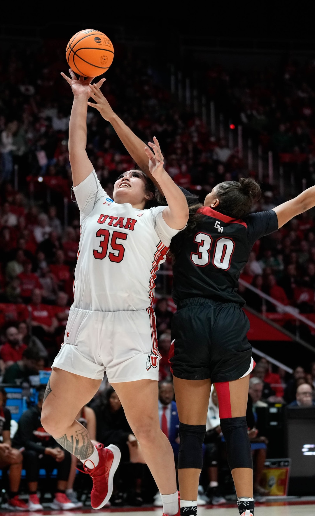 (Francisco Kjolseth | The Salt Lake Tribune) Utah Utes forward Alissa Pili (35) pushes past Gardner-Webb Runnin' Bulldogs forward Alasia Smith (30) for a shot on basket of a first-round college basketball game in the NCAA Tournament, Friday, March 17, 2023, in Salt Lake City, Utah.