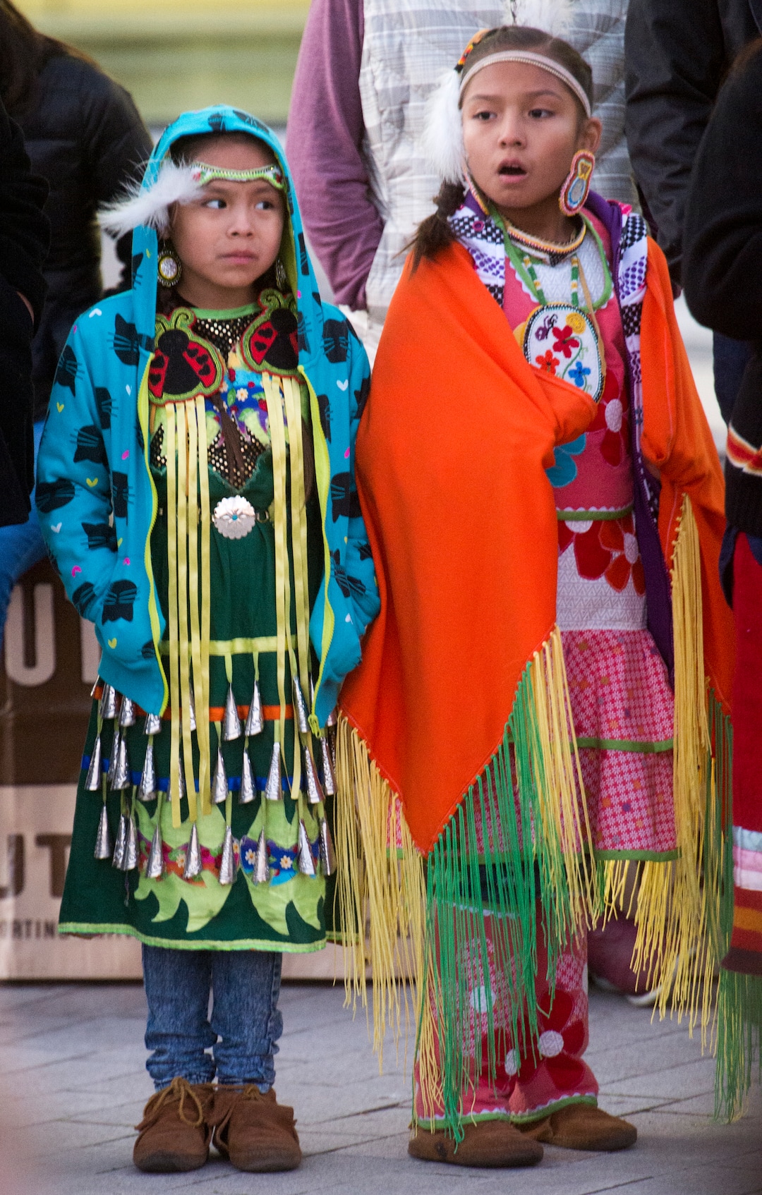 (Rick Egan  |  The Salt Lake Tribune)  Alyssa Dashee, 7, and Kayla Dashee, 10 of Holladay, wait for their turn to dance, during the Indigenous Peoples Day celebration, hosted by the Utah League of Native American Voters and PANDOS (Peaceful Advocates for Native Dialogue and Organizing Support) at the Salt Lake City Library, Monday, October 9, 2017.