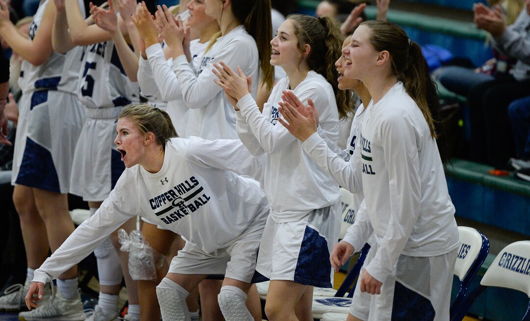 (Francisco Kjolseth  |  The Salt Lake Tribune)  The Copper Hills bench erupts during game action against Herriman in West Jordan on Thursday, Jan. 25, 2018.