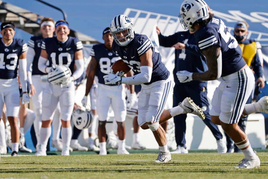 BYU linebacker Isaiah Kaufusi (53) runs with a fumble recovery against North Alabama in the second quarter during an NCAA college football game Saturday, Nov. 21, 2020, in Provo, Utah. (AP Photo/Jeff Swinger, Pool)