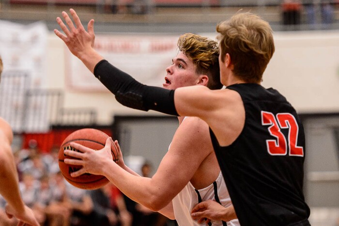 (Trent Nelson | The Salt Lake Tribune)  Olympus's Caden Kuhn looks to shoot as American Fork hosts Olympus in the Utah Elite Eight tournament, Saturday December 9, 2017.