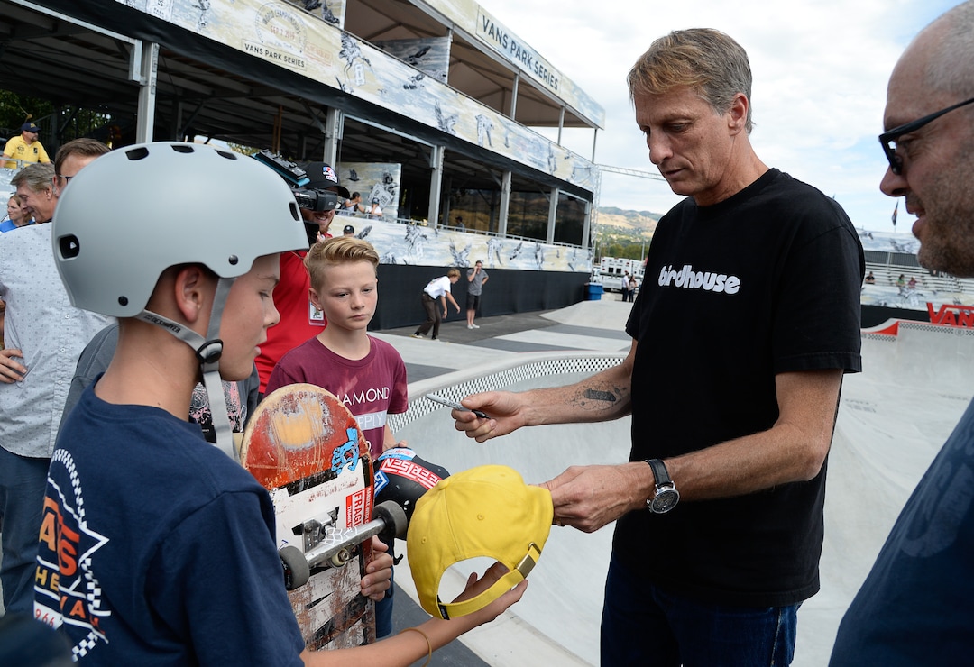 (Francisco Kjolseth  |  The Salt Lake Tribune)  Skate legend Tony Hawk signs autographs for young fans as they gather for a community skate and first look of the new Vans - Utah Sports Commission Skatepark at the Utah State Fairpark on Tuesday, Sept. 3, 2019.