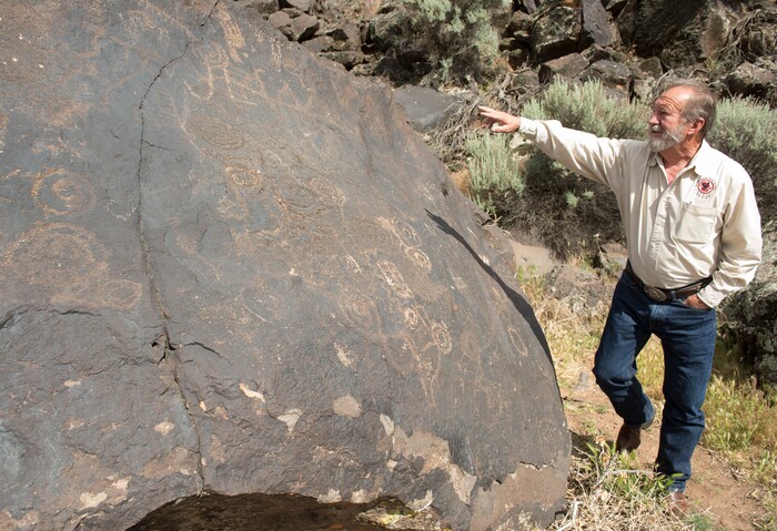 (Rick Egan  |  Tribune File Photo)  Paiute Indian Tribe of Utah Economic Development Director Gaylord Robb explains the Paiutes  rock art near Toquerville, Tuesday, May 5, 2015.