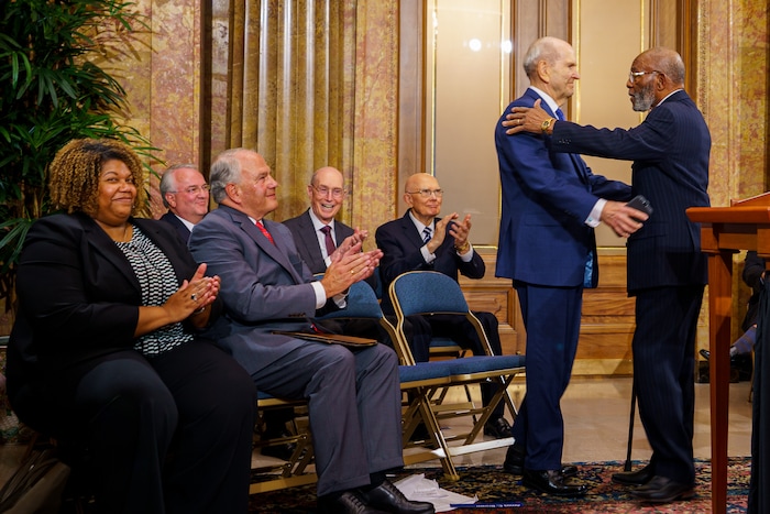 (Trent Nelson | The Salt Lake Tribune) President Russell M. Nelson and Amos C. Brown embrace during the announcement of new joint initiatives with the NAACP in Salt Lake City on Monday, June 14, 2021.