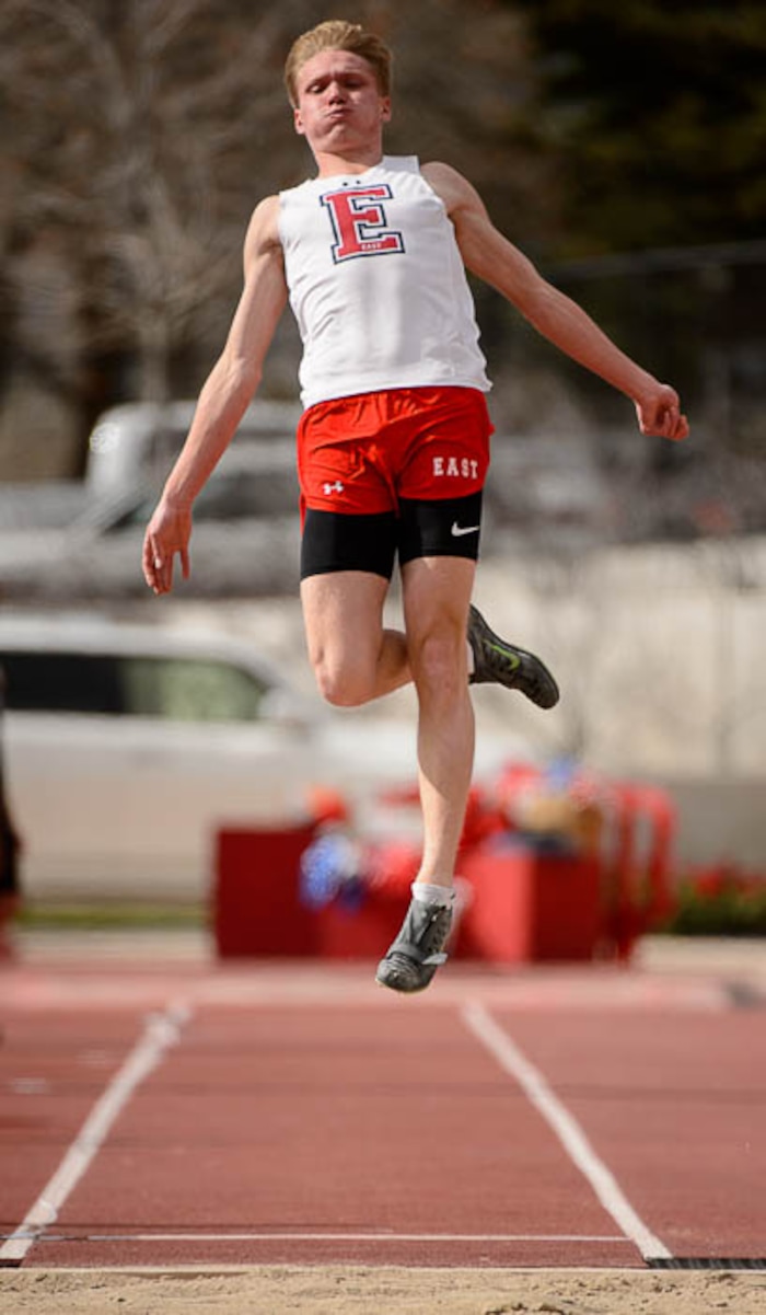 (Trent Nelson | The Salt Lake Tribune)  East track star Will Prettyman, one of the state's best long jumpers and sprinters, competing in the long jump, Thursday April 5, 2018.