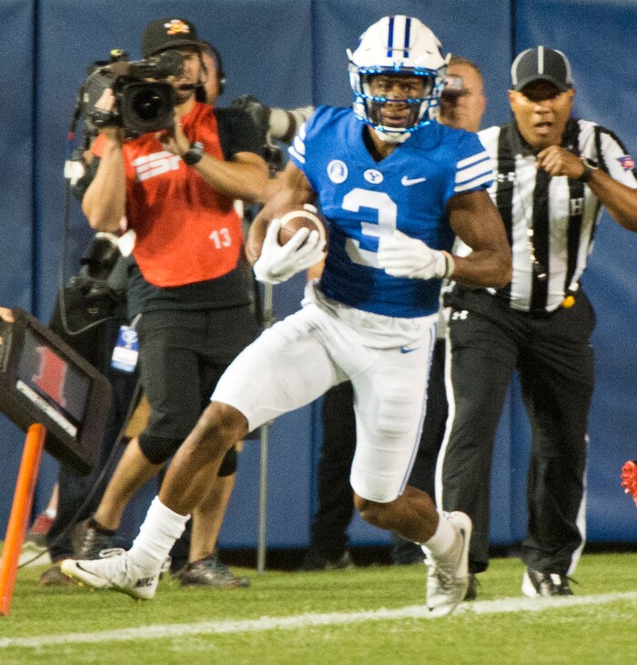 (Rick Egan  |  The Salt Lake Tribune)  Brigham Young wide receiver Jonah Trinnaman (3) runs the ball for the Cougars, in football action BYU vs Utah, at Lavell Edwards Stadium in Provo, Saturday, September 9, 2017.