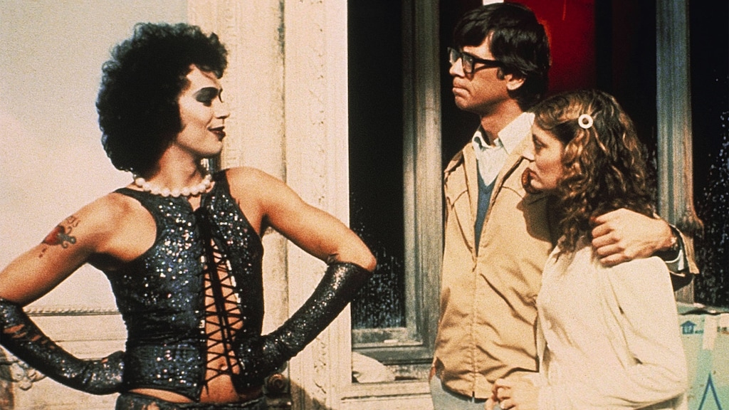 (20th Century Fox) Newly engaged Brad Majors (Barry Bostwick, near right) and Janet Weiss (Susan Sarandon, right) encounter the strange Dr. Frank N. Furter (Tim Curry, left), in a scene from the 1975 cult classic "The Rocky Horror Picture Show."