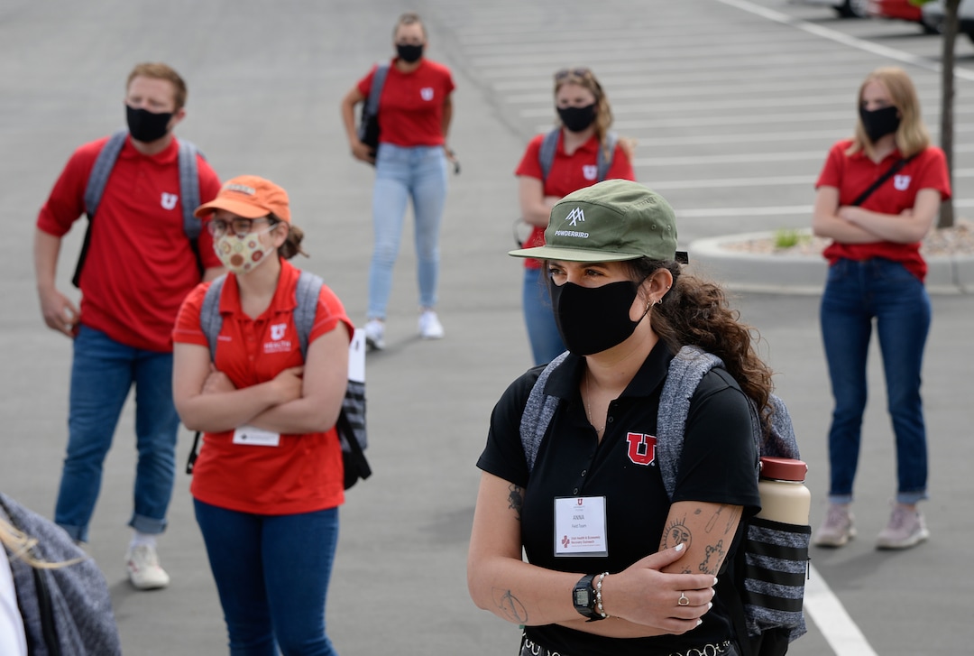 (Francisco Kjolseth  |  The Salt Lake Tribune) College students from numerous institutions gather in Herriman on Thursday, May 4, 2020, before fanning out into the community to explain the Utah Health & Economic Recovery Outreach program in hopes of finding people willing to be tested for COVID-19, to find out how widespread the disease actually is in the state. Educators and business leaders are hoping the HERO program, where college-age volunteers are now randomly finding residents to be tested for COVID-19, will blossom into something bigger. They are proposing to expand it into what will be called Hope Corps, with hundreds of students and other volunteers offering hands-on advice and resources to restaurants and retailers who's businesses are struggling in the pandemic.