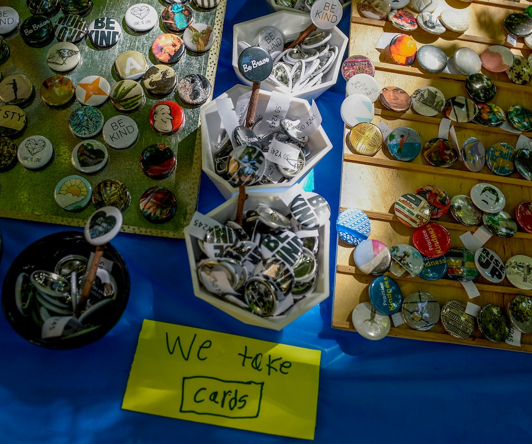 (Leah Hogsten  |  The Salt Lake Tribune)  l-r Brothers Simon Lewis, 9, and Elliot Lewis, 7, sell art buttons at their Button Up booth at the Craft Lake City DIY Festival Kid Row, where children 14 and under make and sell their products. Craft Lake CityÕs DIY Festival is UtahÕs largest local, three day arts festival with over 300 artisans, DIY engineers, vintage vendors and craft food creators.