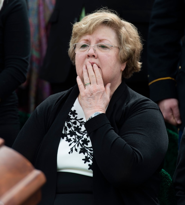 (Rick Egan  |  The Salt Lake Tribune)     Mary Ann Turner, the daughter of 2nd Lt. Lynn W. Hadfield, reacts as she sees the 4 Apacahe helicopters during the graveside service for her father, who was killed during the Second World War, at Veterans Memorial Park, in Bluffdale. Thursday, March 21, 2019.


