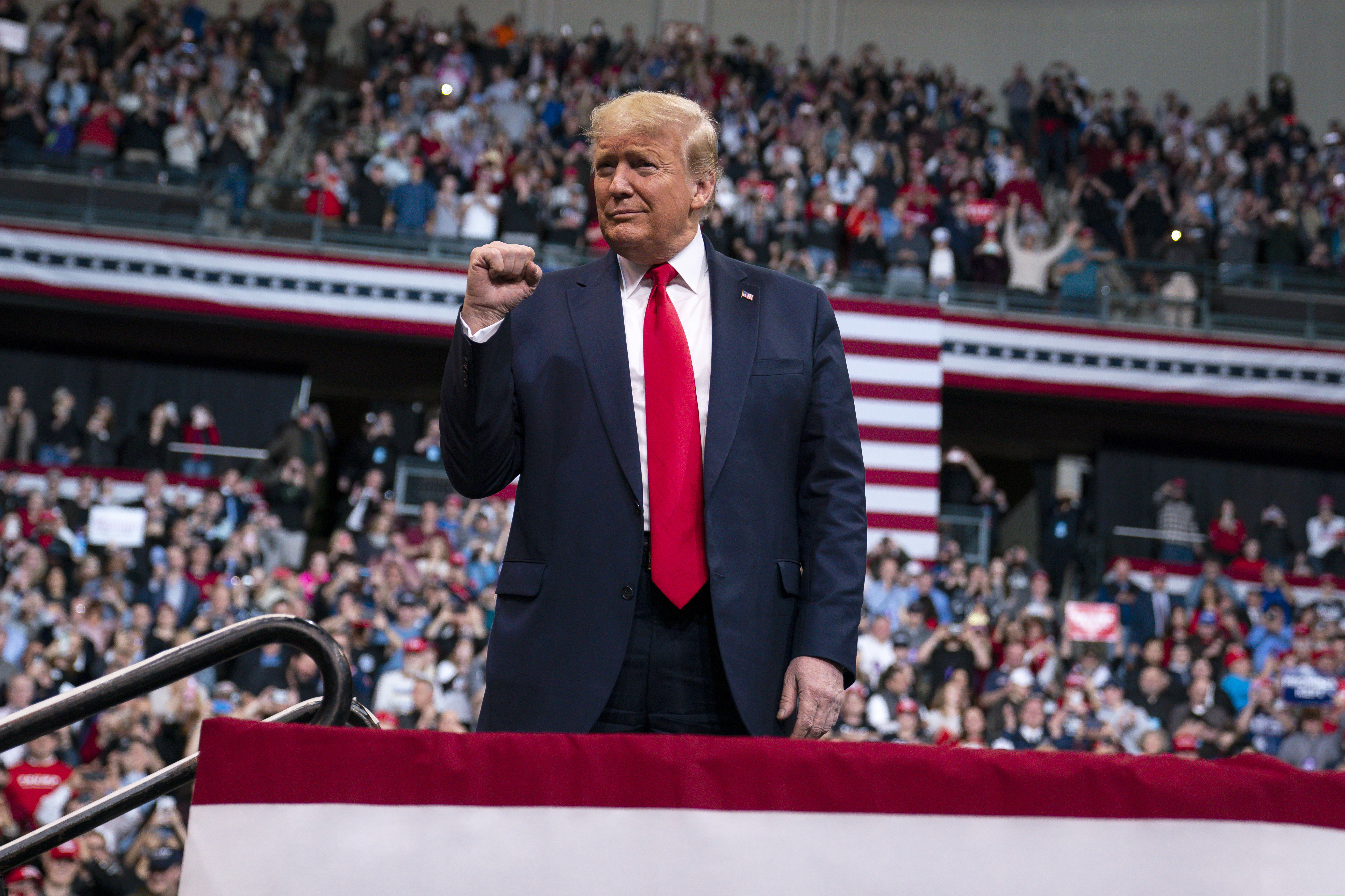 (Evan Vucci | AP) President Donald Trump arrives at SNHU Arena for a campaign rally, Monday, Feb. 10, 2020, in Manchester, N.H.