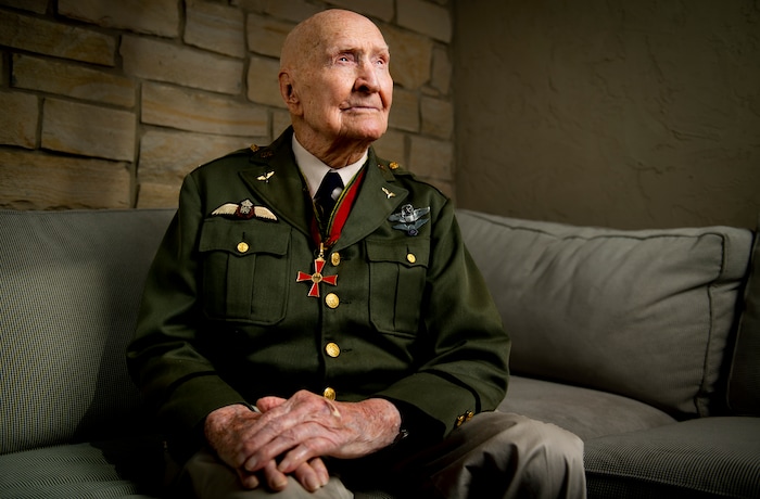 (Isaac Hale | The Daily Herald via AP) Gail Halvorsen, also know as the "Candy Bomber", poses for a portrait at his son's home in Midway, on Wednesday, Oct. 7, 2020. Air Force Colonel (retired) Gail S. Halvorsen changed the course of history with just two pieces of gum. Now has made a bit of his own history. Halvorsen turned 100 years old this month.